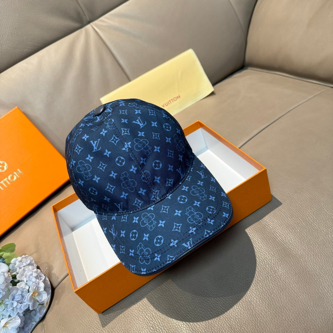 Louis Vuitton monogram baseball cap, blue with repeating logo pattern