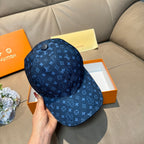 Louis Vuitton monogram cap, blue, front view with adjustable top button