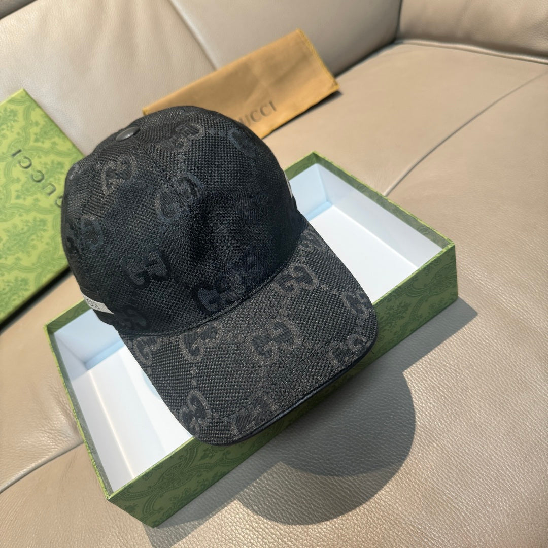 Black Gucci monogram baseball cap, side view with curved brim and logo pattern