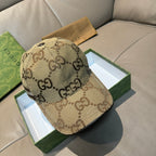 Gucci monogram baseball cap in beige, curved brim, logo web stripe at front.