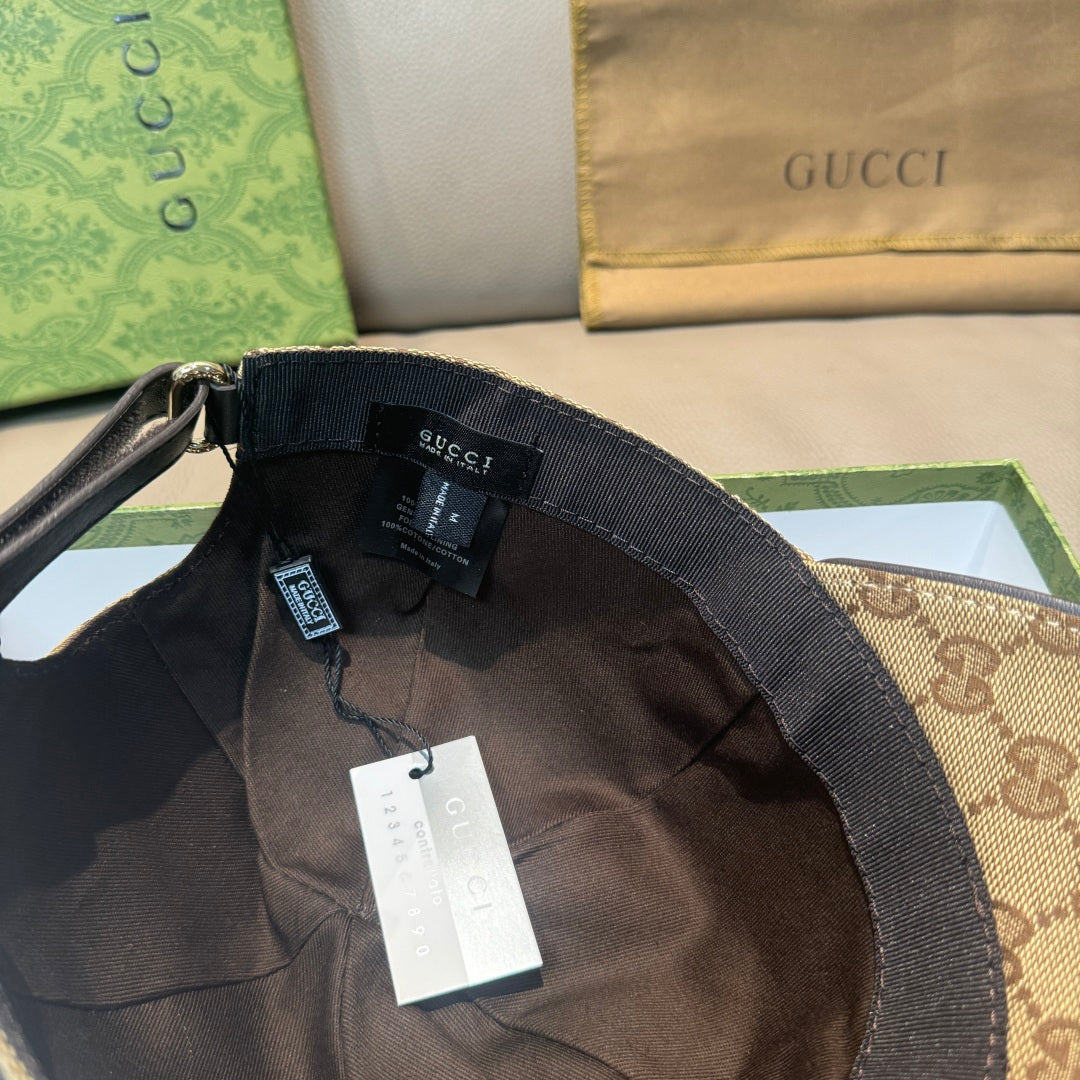Black Gucci cap interior with adjustable strap and size tag