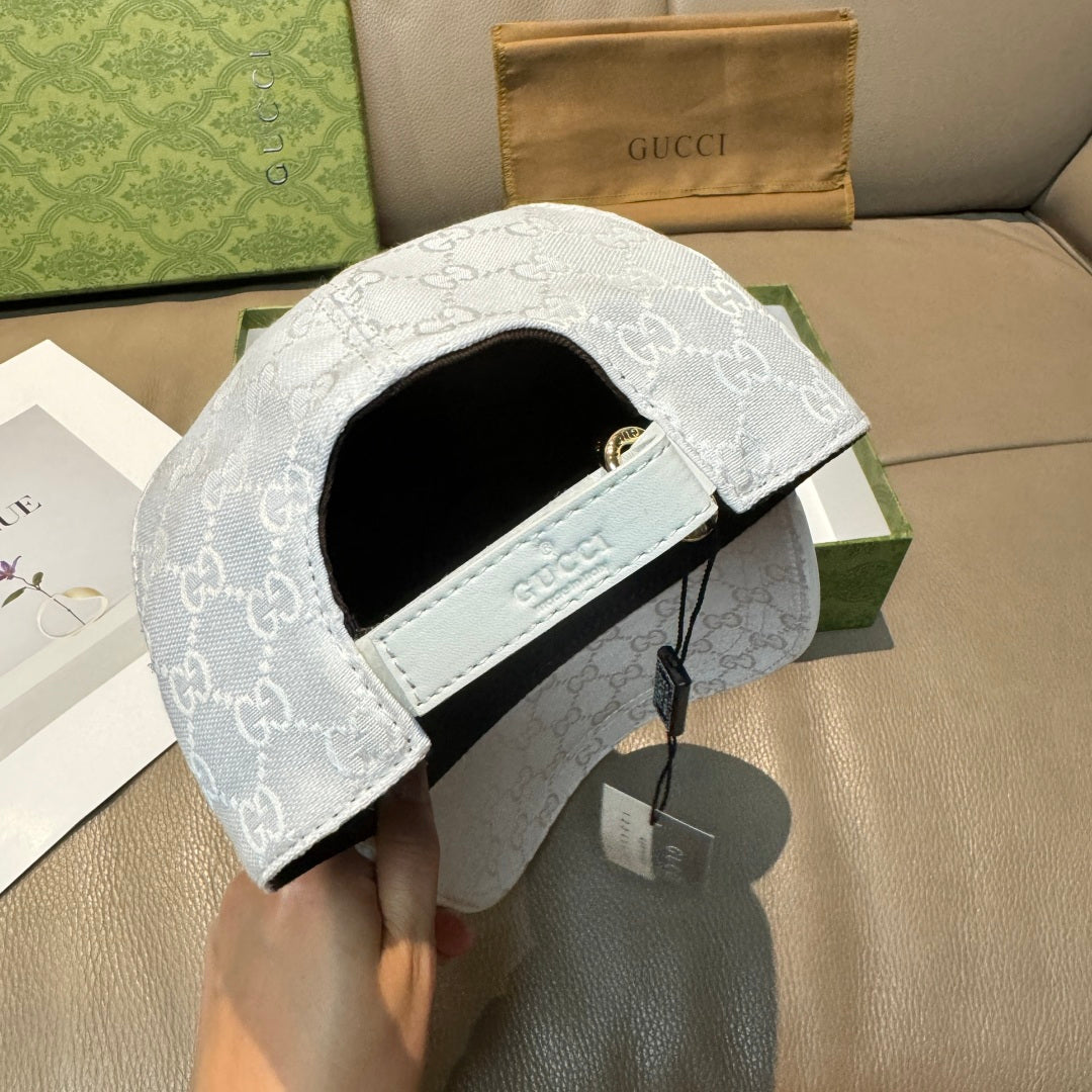 White Gucci baseball cap underside with adjustable strap and interior tag