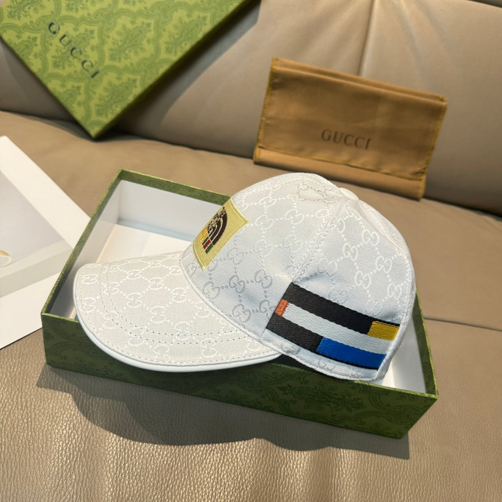 White Gucci baseball cap with GG pattern and multicolor front stripe detail