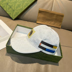 White Gucci baseball cap with GG pattern and multicolor front stripe detail