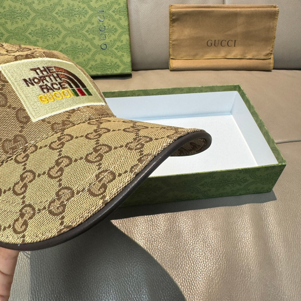 Gucci GG monogram cap close-up with front logo patch and dark brim edge