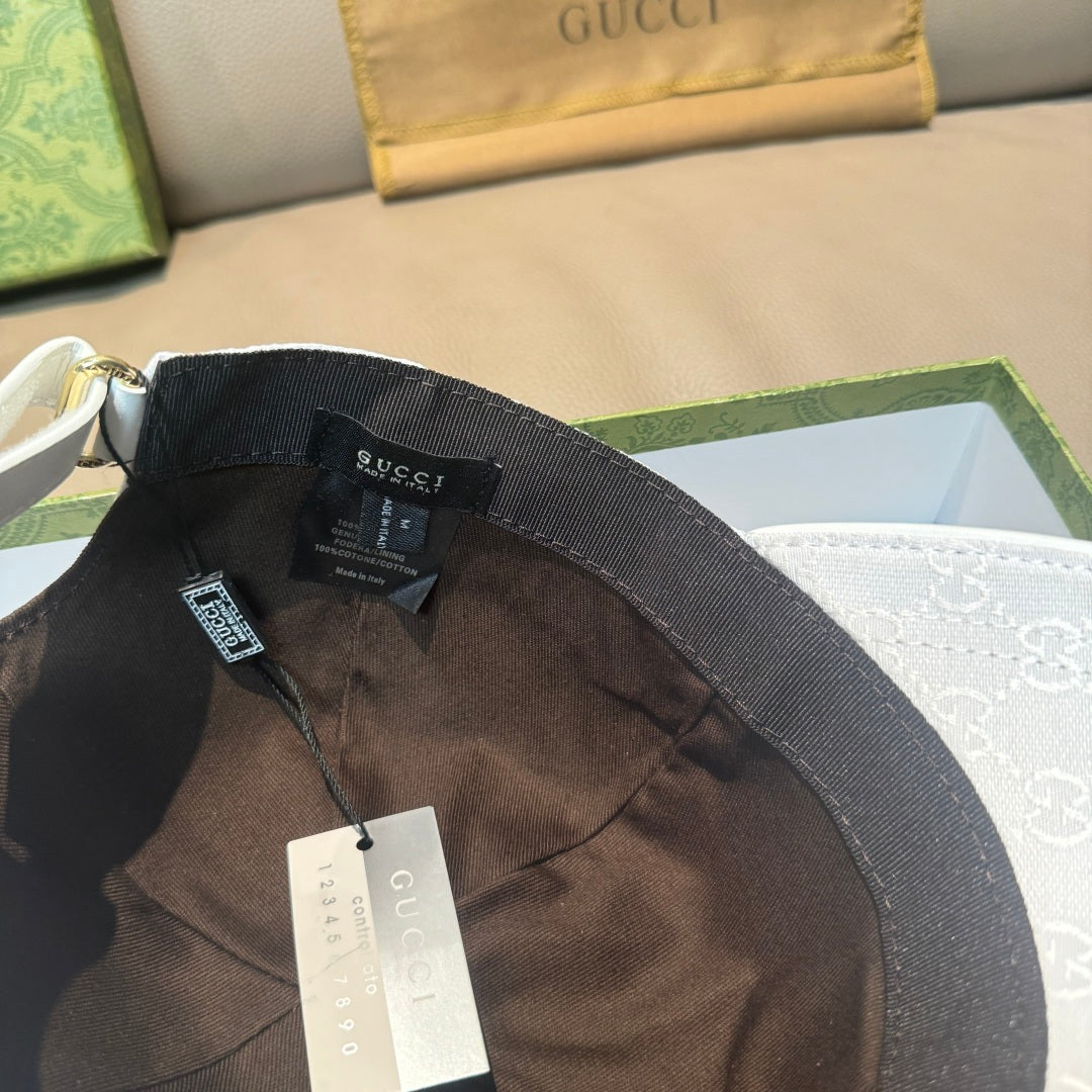 Black Gucci baseball cap interior with strap, mesh lining, and hanging tags