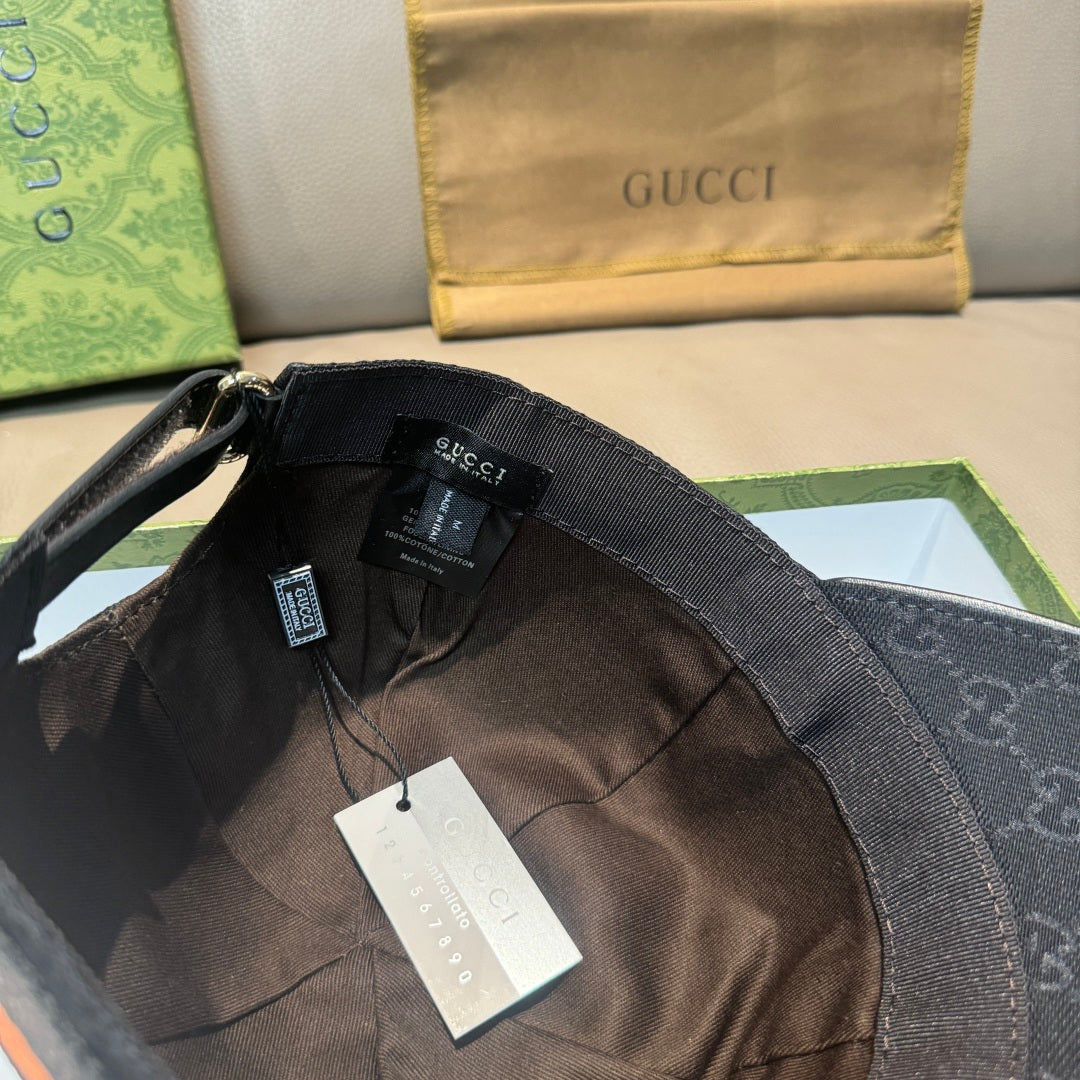 Black Gucci cap interior with fabric strap and small hanging label