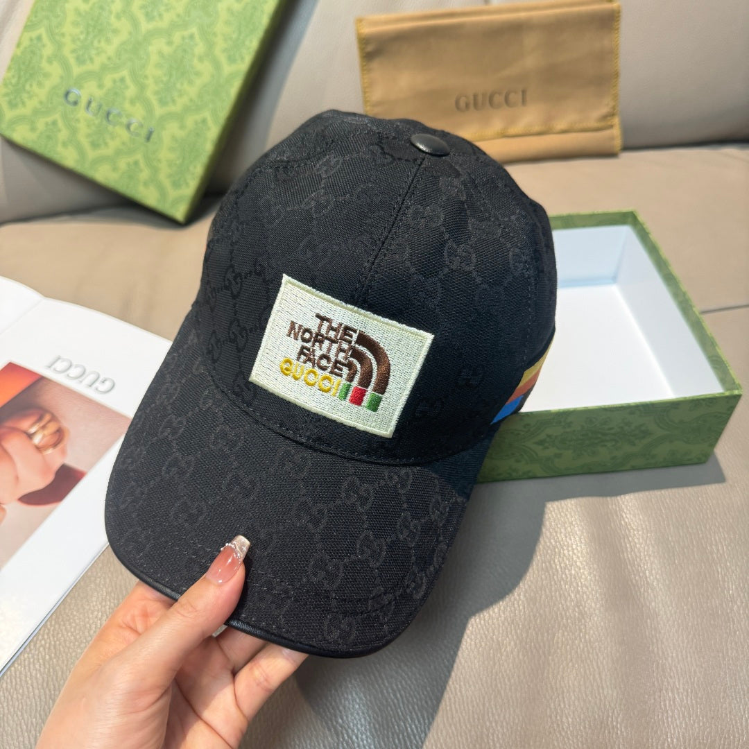Black Gucci cap with white The North Face logo patch and multicolor stripe