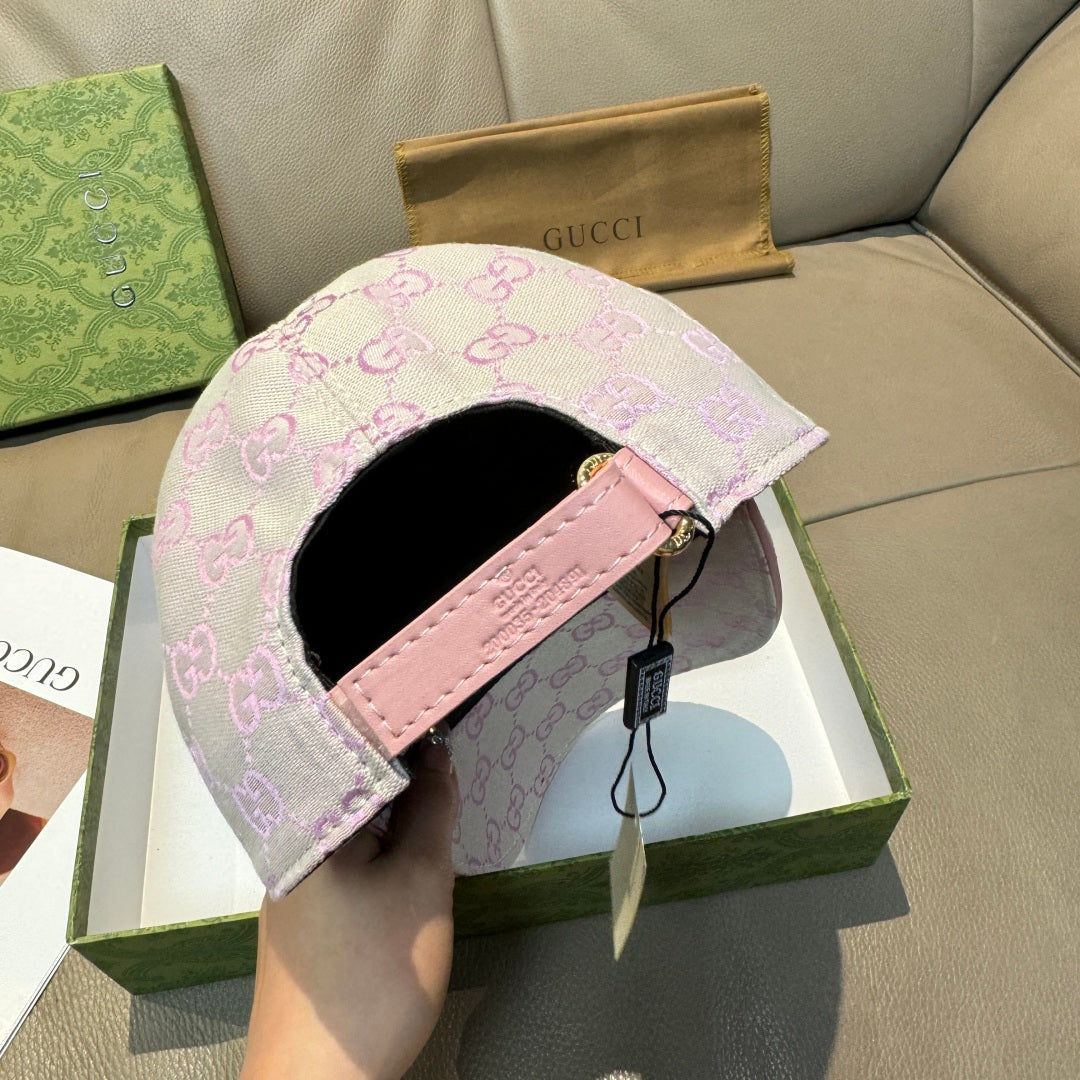 Light pink Gucci GG baseball cap interior view with adjustable strap and tag