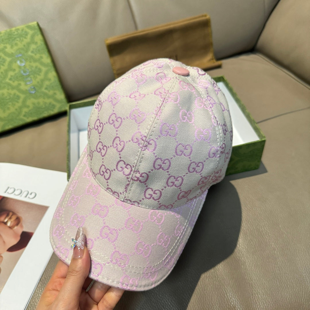 Light pink Gucci GG baseball cap, angled view showing back button detail