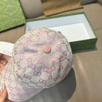 Light pink Gucci GG baseball cap, close side view with top button and stitching