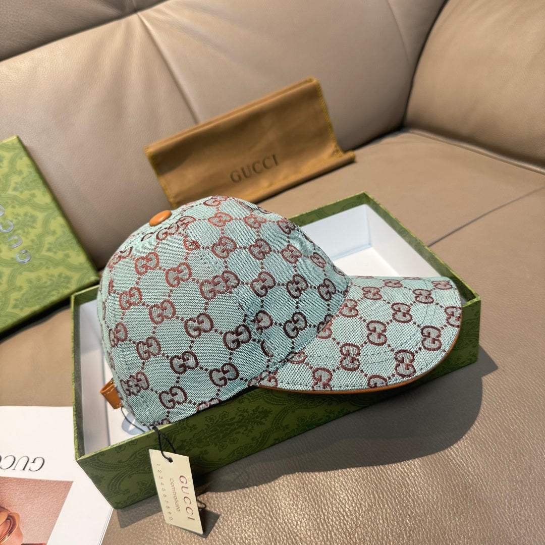 Gucci cap with light blue GG monogram print and matching rear strap detail
