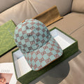 Gucci cap in light blue with red GG monogram pattern and curved brim