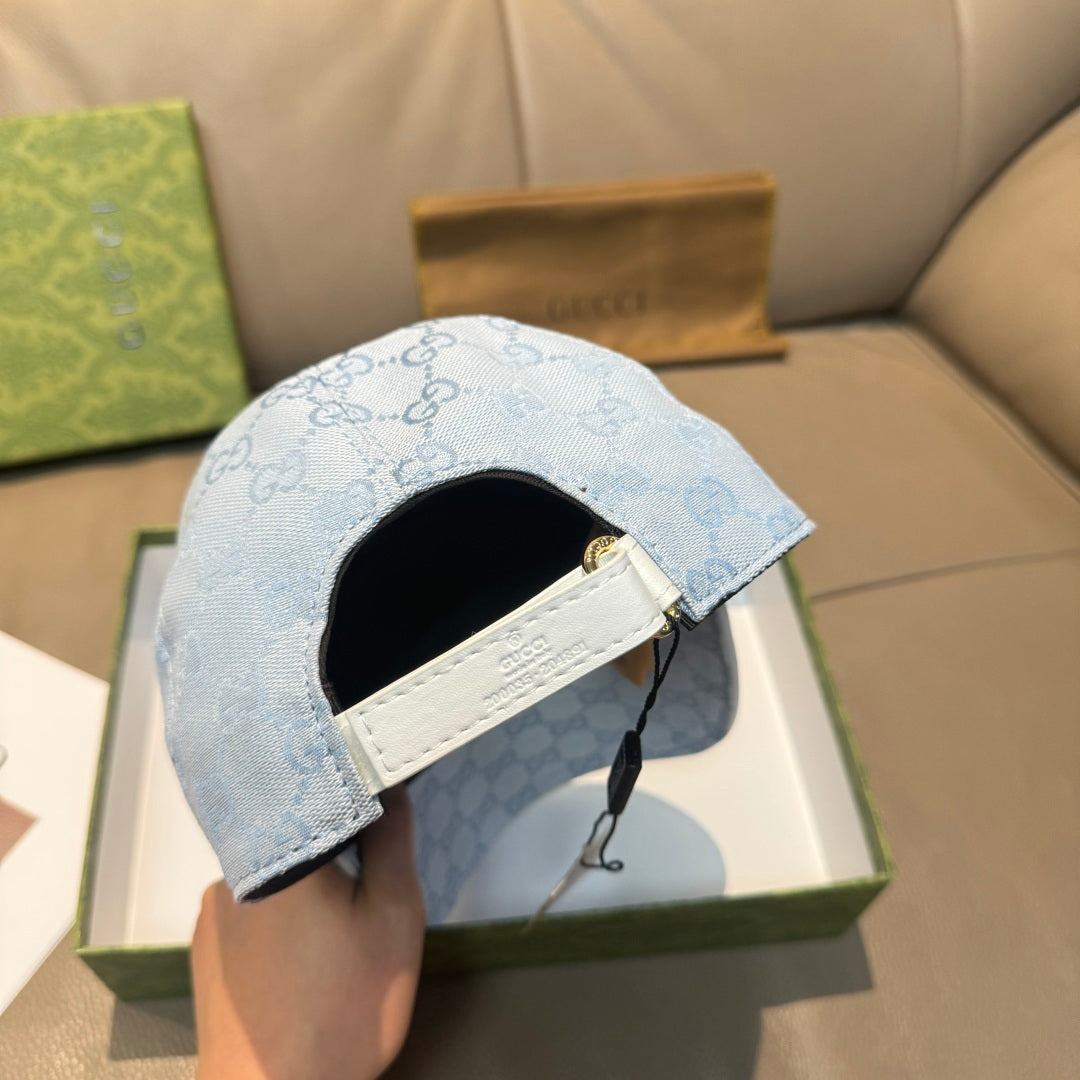 Gucci light blue monogram cap showing inside label and strap