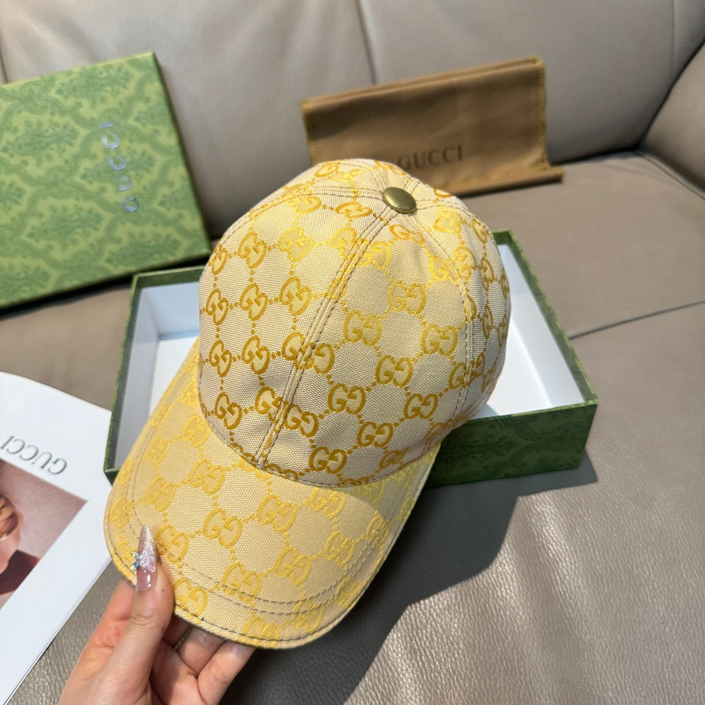 Gucci GG-pattern baseball cap in yellow with curved brim and round top button