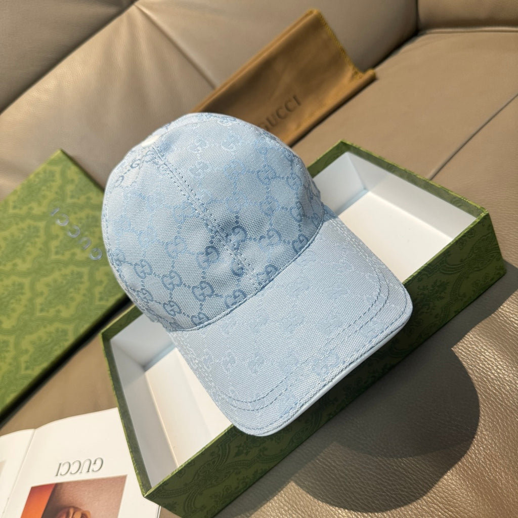 Gucci light blue monogram baseball cap with curved brim and stitched panel
