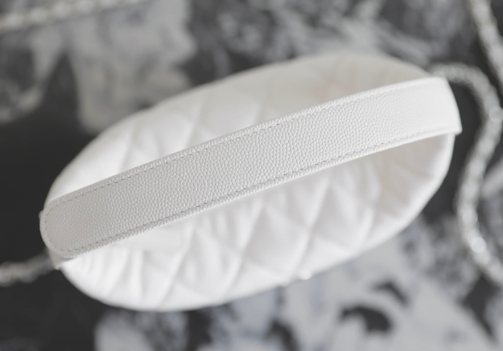 Chanel white leather strap on quilted mini bag with chain detail