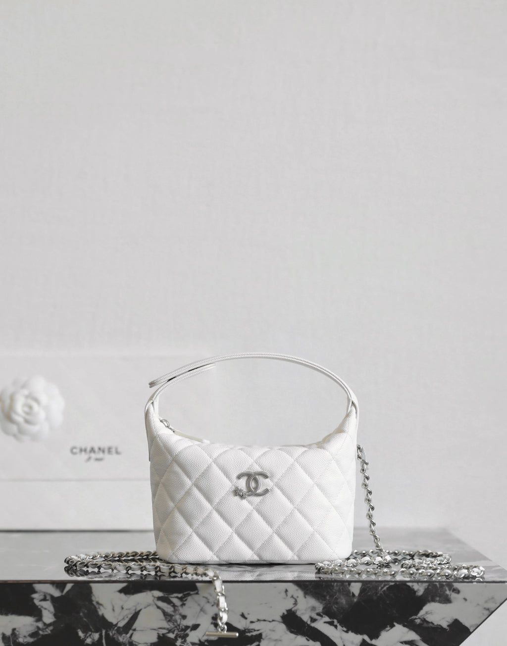 Chanel white quilted mini bag with interlaced chain strap