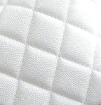 Chanel white quilted leather texture close-up