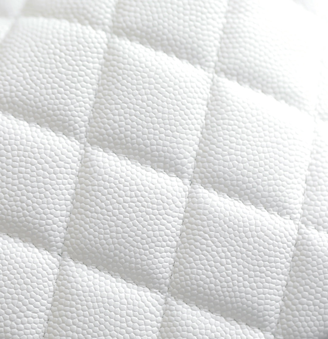 Chanel white quilted leather texture close-up