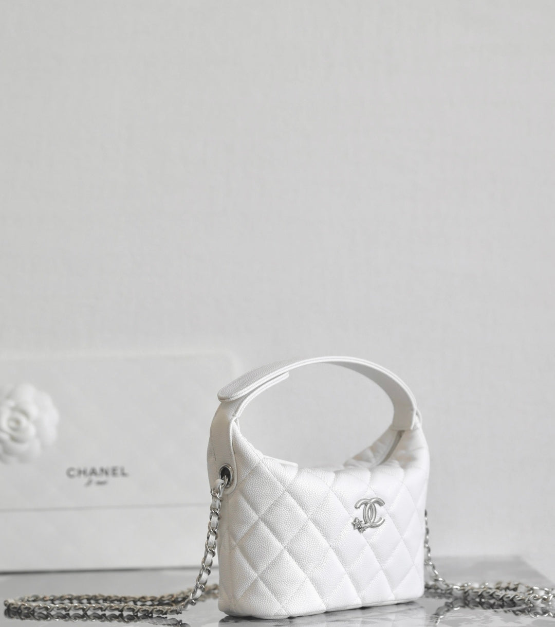 Chanel white quilted mini bag with side logo and chain strap