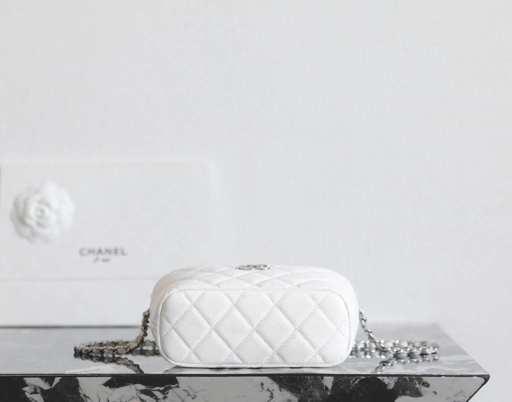 Chanel white quilted crossbody bag with chain strap and front logo