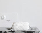 Chanel white quilted crossbody bag with chain strap and front logo