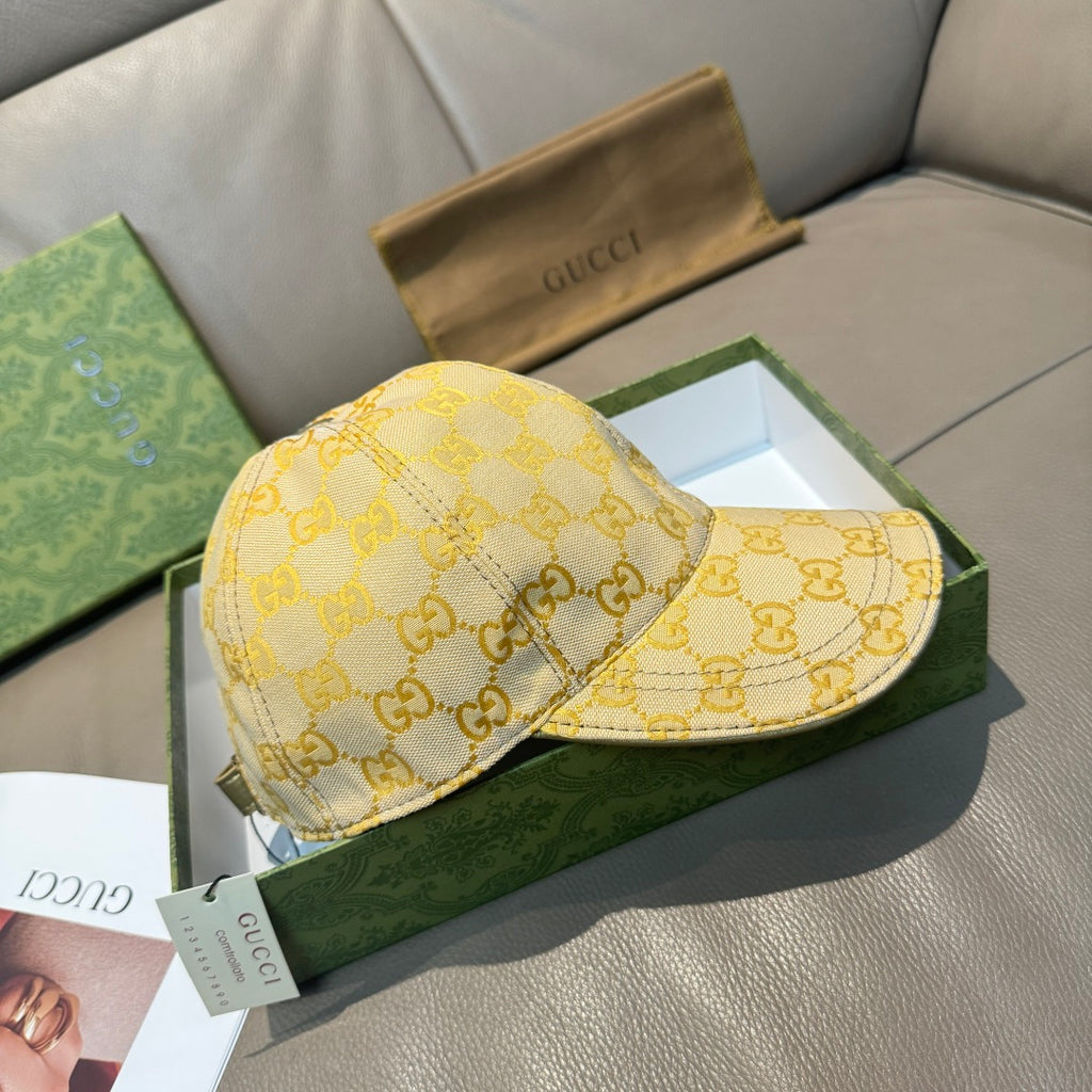 Gucci GG-pattern baseball cap in yellow with curved brim and side panel detail