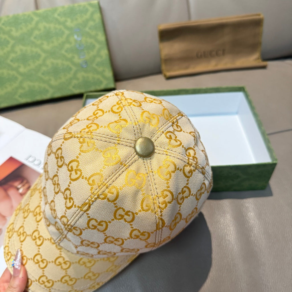 Gucci GG-pattern baseball cap in yellow with domed top button and crown seams