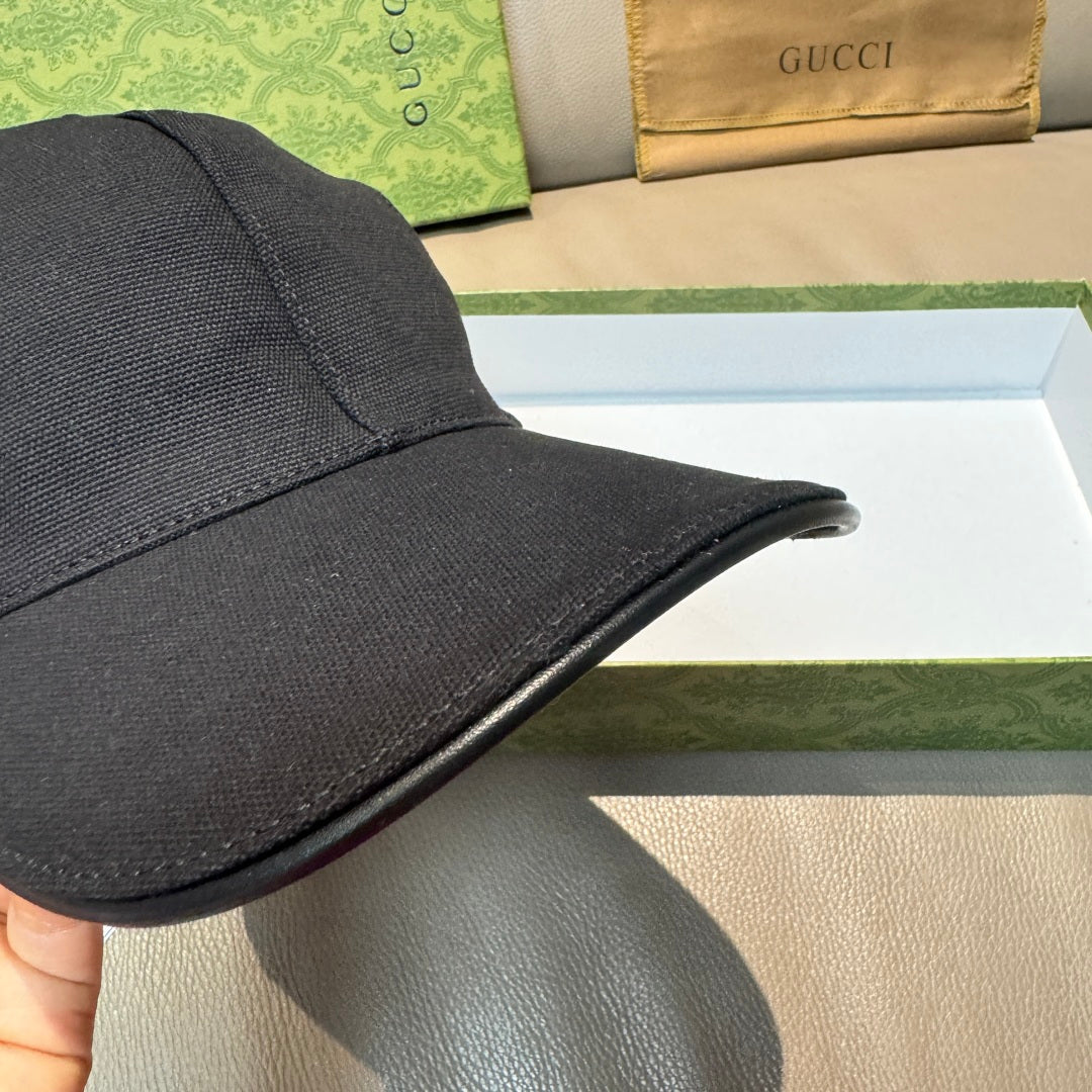 Black baseball cap brim with textured fabric and stitched edge