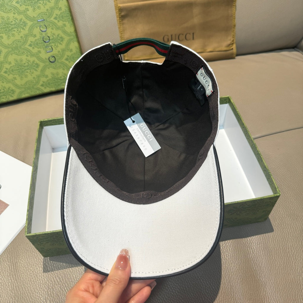 Gucci black cap interior view with size tag inside crown.