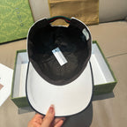 Gucci black cap interior view with size tag inside crown.
