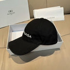 Balenciaga black baseball cap with side BALENCIAGA logo and curved brim