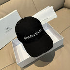 Balenciaga black baseball cap with embroidered BALENCIAGA lettering on the brim