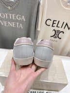 Lilac and white lace-up sneakers, heel and back view pair