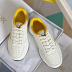 Dior unisex leather sneakers, white with yellow panels and lace-up front