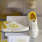 Dior unisex low-top sneakers, white with yellow logo detail and lace-up