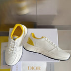 Dior unisex low-top sneakers, white with yellow side panels and textured sole
