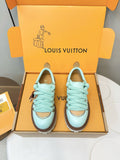 Louis Vuitton light blue sneakers with brown trim, gold eyelets, lace-up design