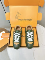 Green low-top sneakers with white laces and LV logo, in orange gift box