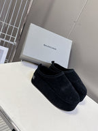 Balenciaga black suede slip-on sandals with stitched vamp and low heel