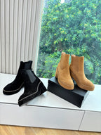 Women’s ankle boots, tan and black Chelsea styles with block heels and elastic sides