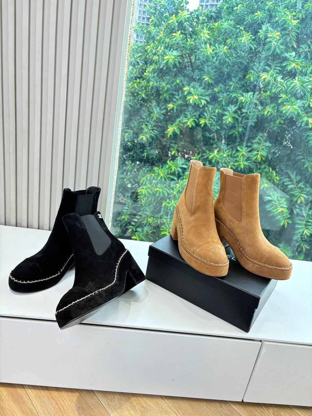 Women’s ankle boots, tan and black Chelsea styles with block heels and elastic sides