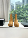 Chanel suede ankle boots, tan with chain trim and stitched toe, stacked heel