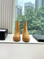 Chanel suede ankle boots, tan with chain trim and stitched toe, stacked heel
