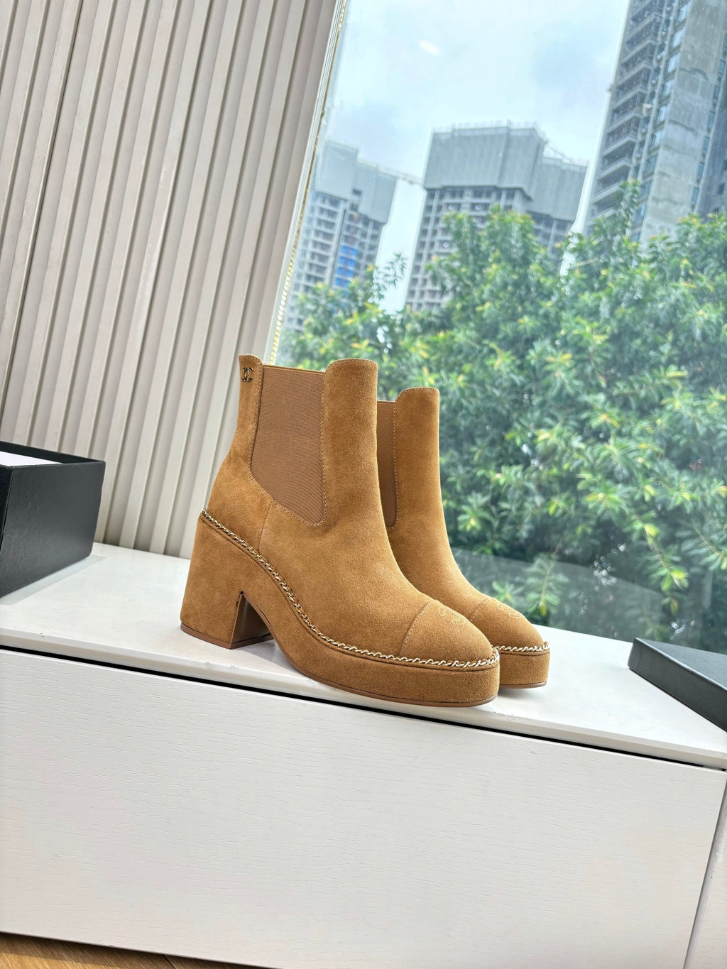 Chanel suede ankle boots with wide block heel, tan pull-on style, chain edging