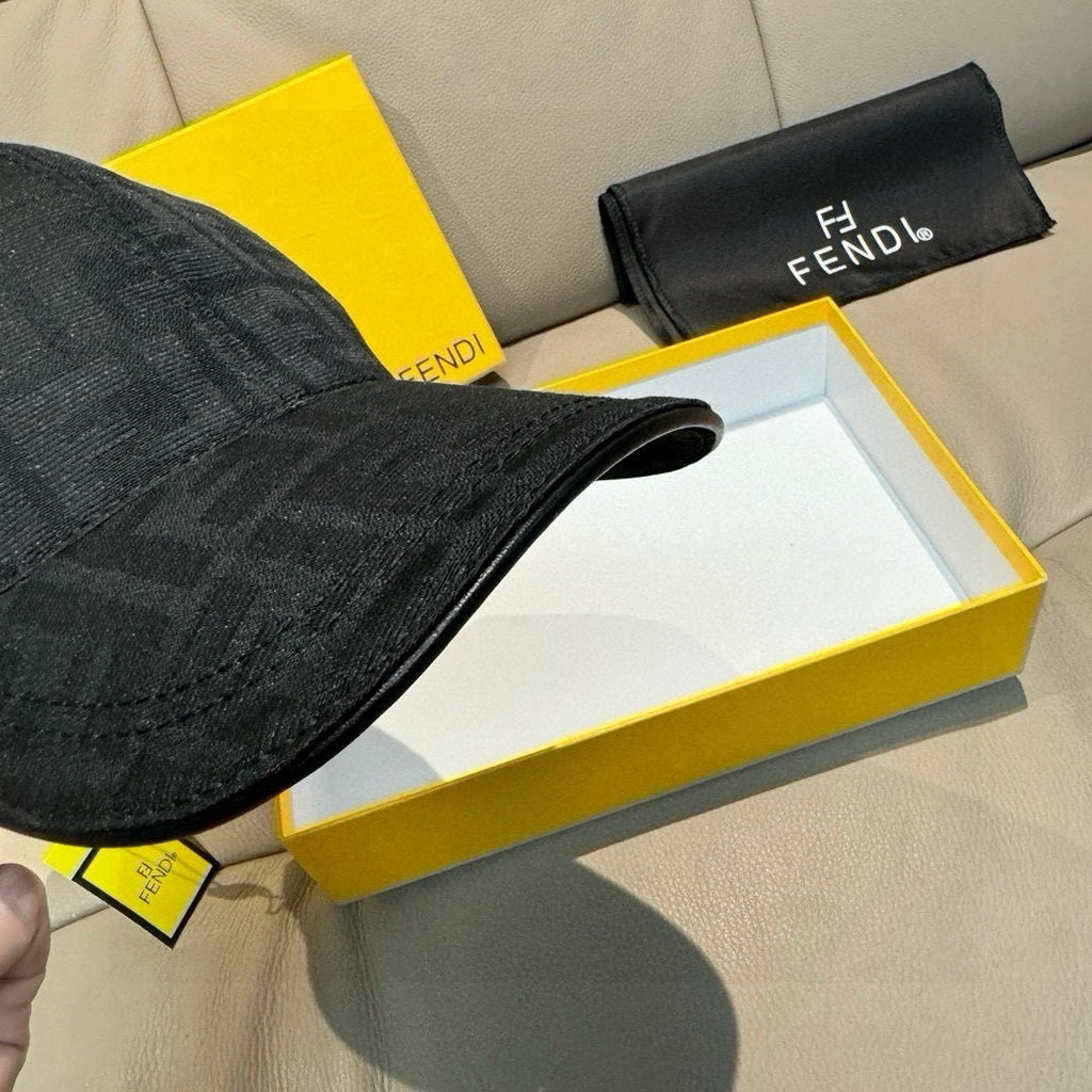 Fendi cap close-up of dark FF monogram fabric and curved brim edge