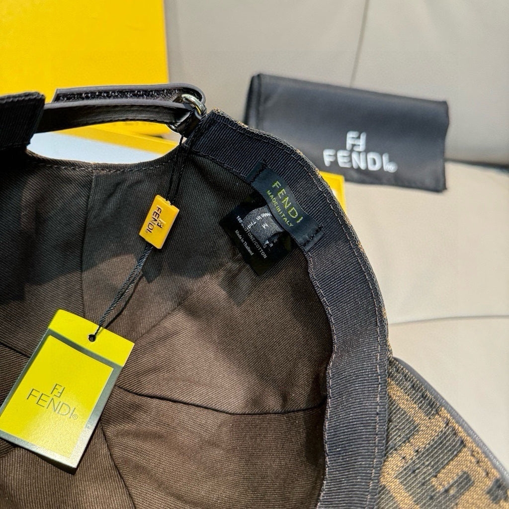 Fendi cap with black adjustable strap and interior lining with tag details