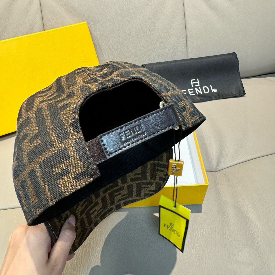 Fendi monogram cap in brown and tan with interior band and curved brim