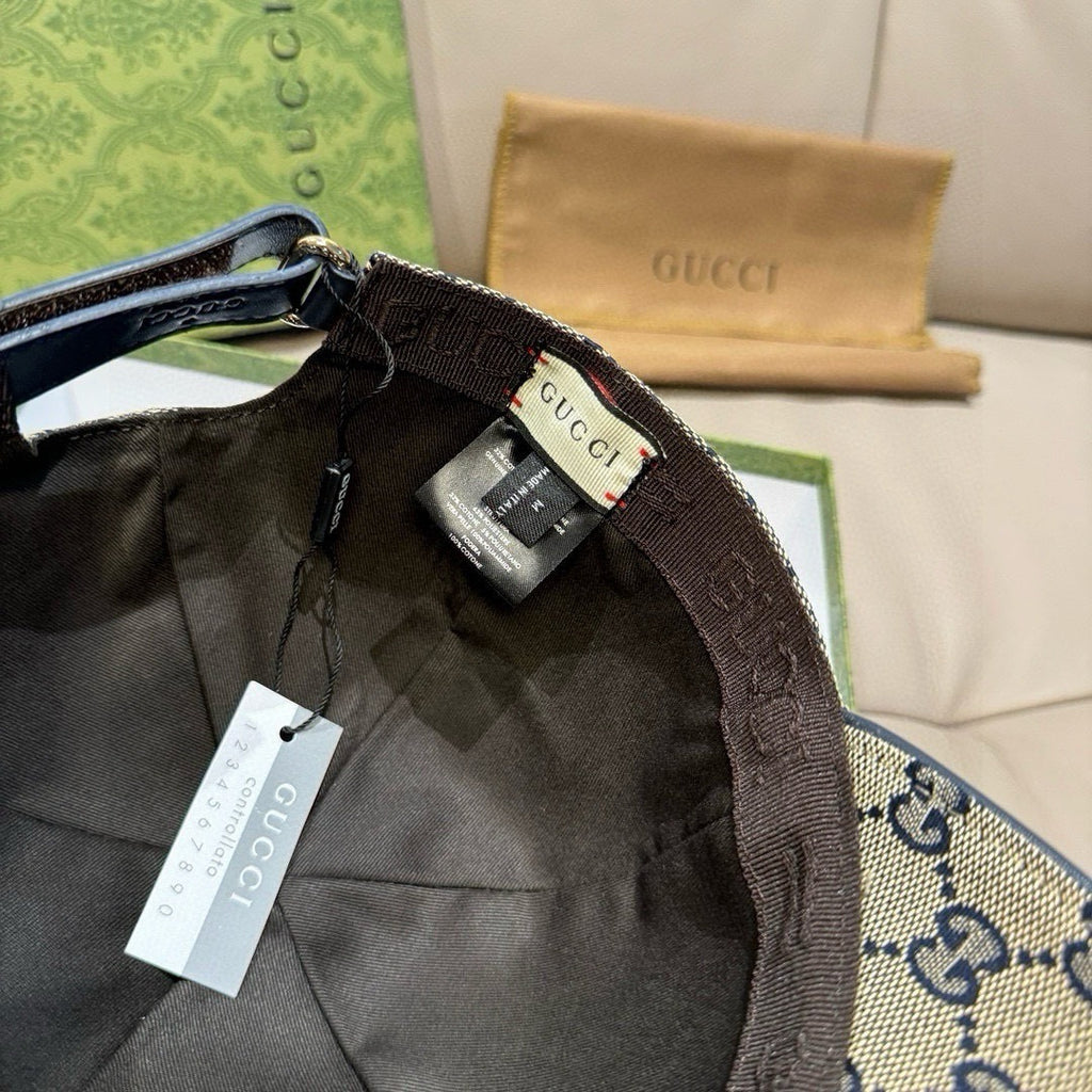 Gucci cap interior with black lining and size tag on the inner seam